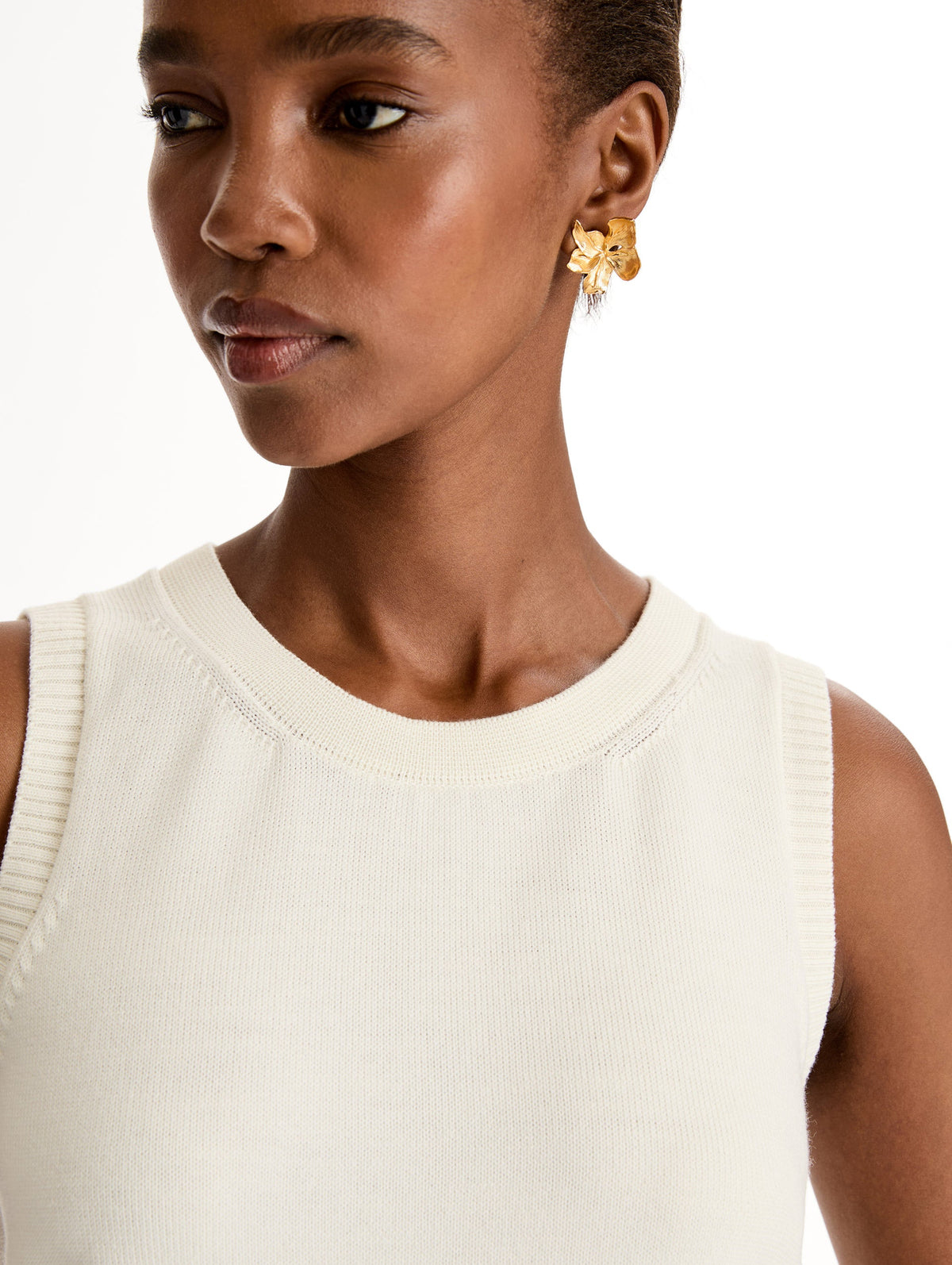 Cream Ribbed Sleeveless Cardigan