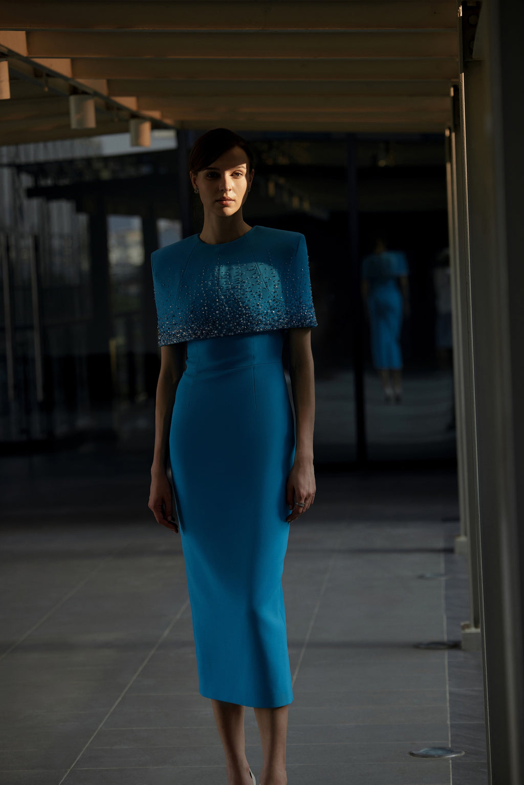 Shoulder cape with pencil shaped dress with round collar