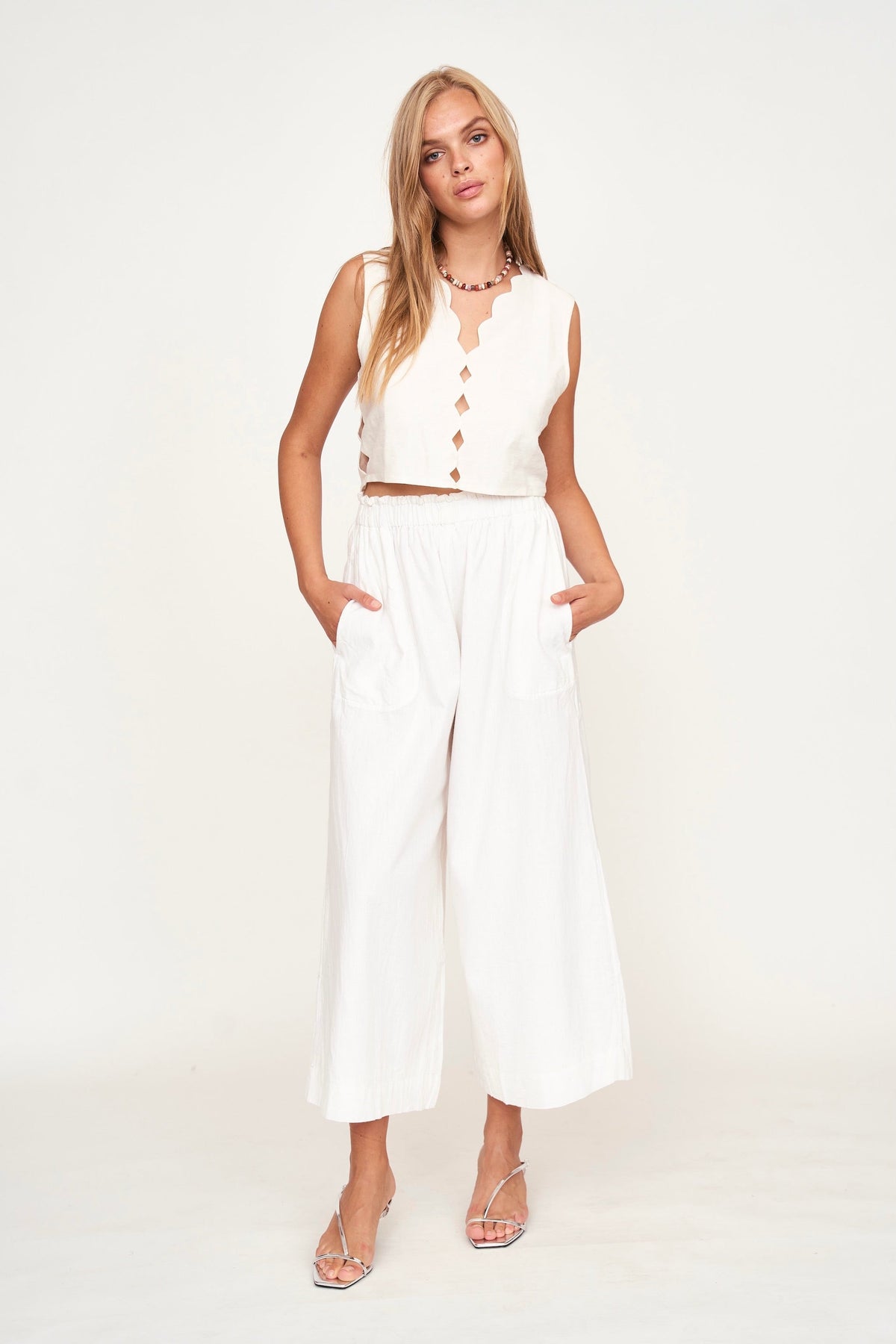 Sleeveless cropped top in White