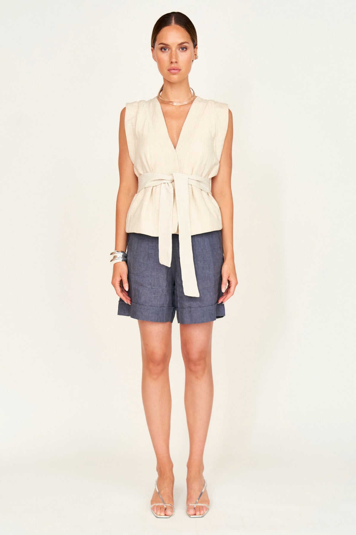 Lightly quilted vest with tie belt
