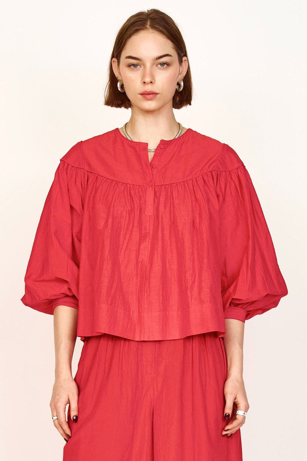 Gathered blouse with front half placket