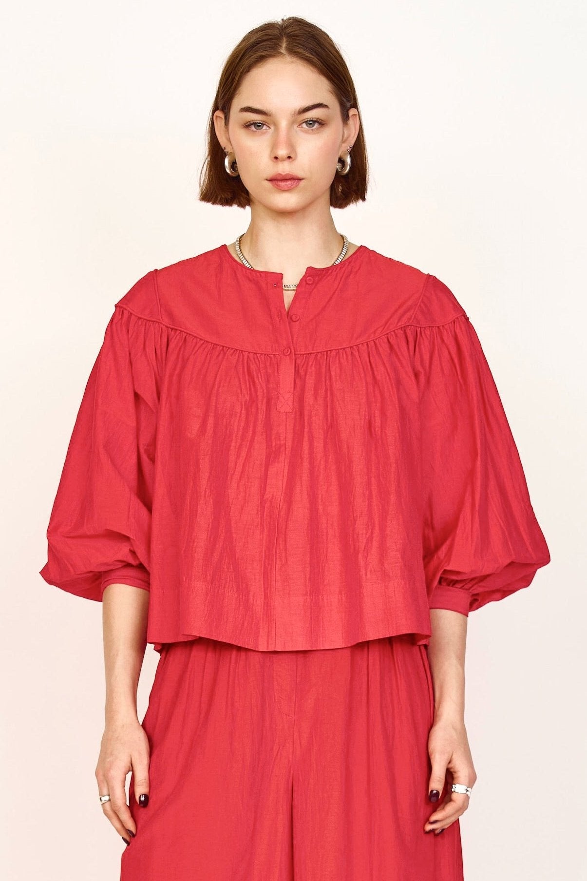 Gathered blouse with front half placket