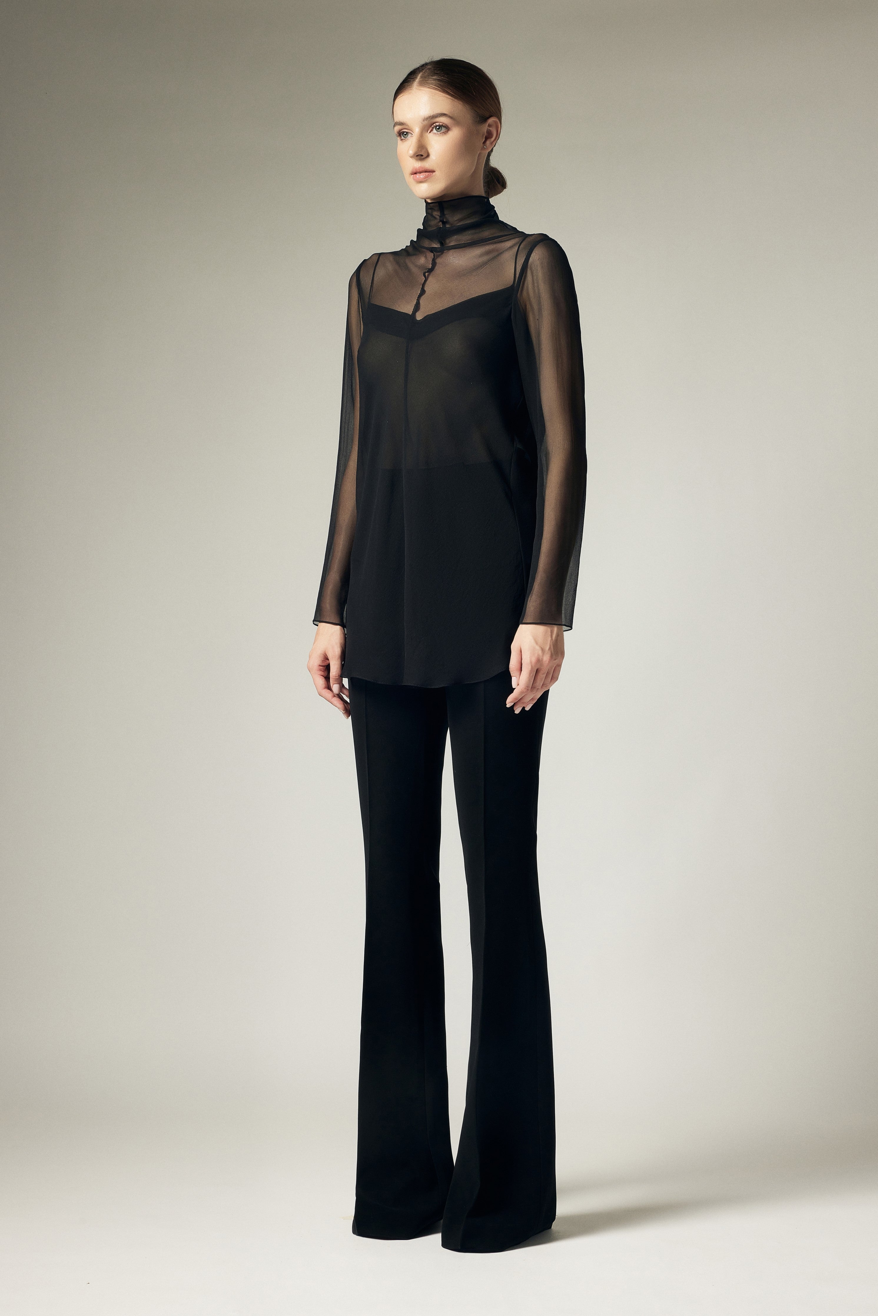 High neck long sleeved shirt with vest underneath